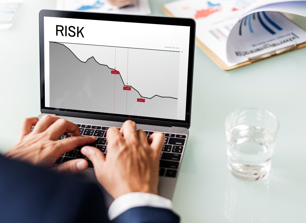 A person is checking why mutual funds are subject to market risk